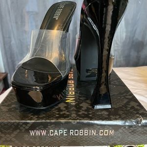 Black High Heeled Cape Robin